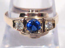 Appraisal: A three stone sapphire and diamond ring