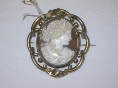 Appraisal: A VICTORIAN CAMEO BROOCH of oval form depicting a maiden