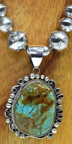 Appraisal: Native American silver content unknown necklace sterling pendant with bezel-set