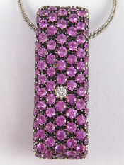 Appraisal: David Morris An carat white gold pink sapphire and diamond