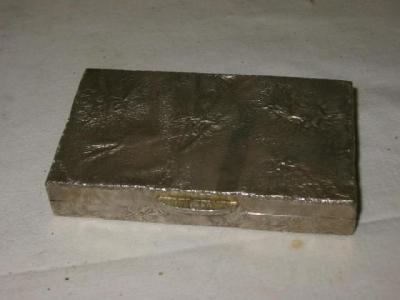 Appraisal: A SNUFF BOX of plain rectangular form cast to resemble