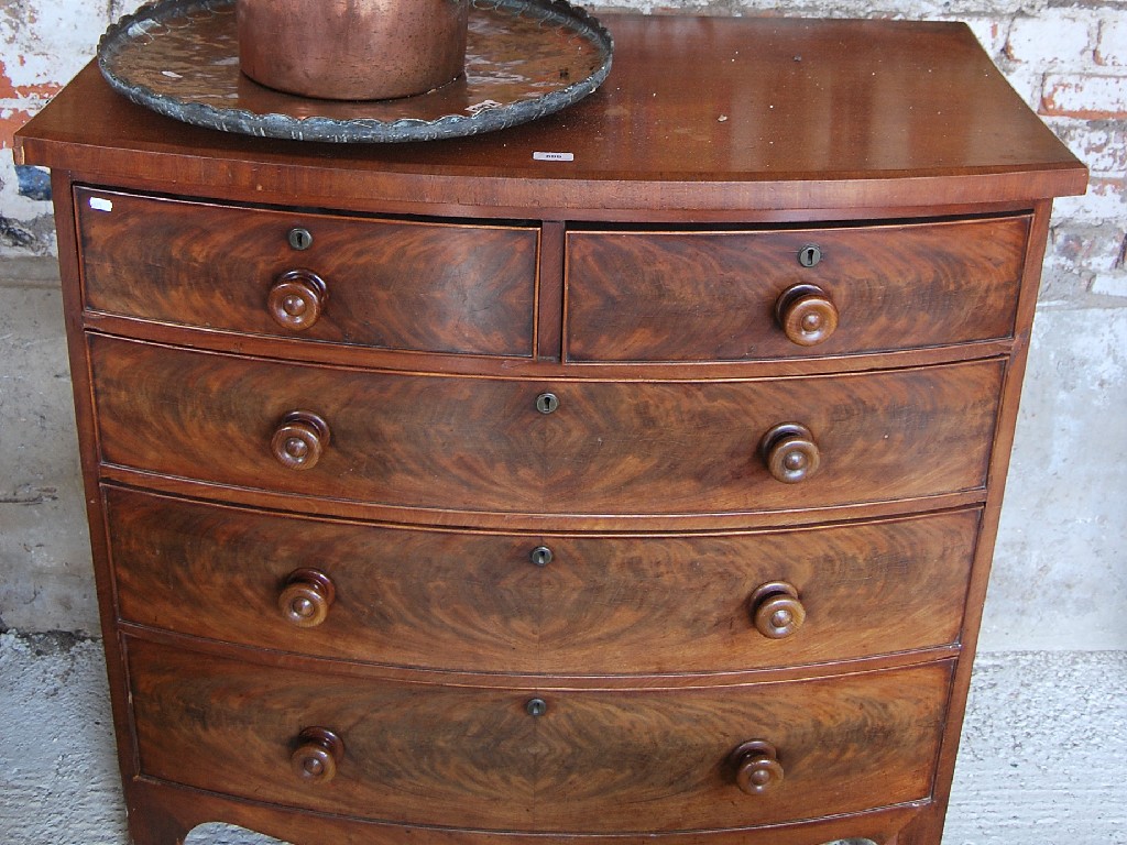 Appraisal: Victorian mahogany bowfront chest of two short and three long