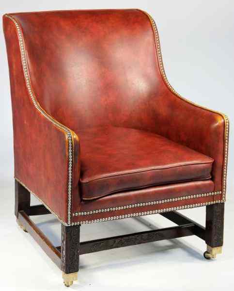 Appraisal: th Century Style Leather Chaircarved walnut legs and stretcher with