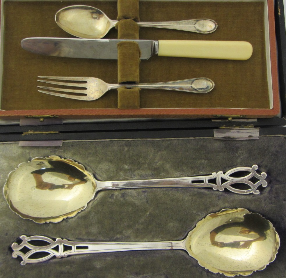 Appraisal: A pair of silver serving spoons with gilt bowls the