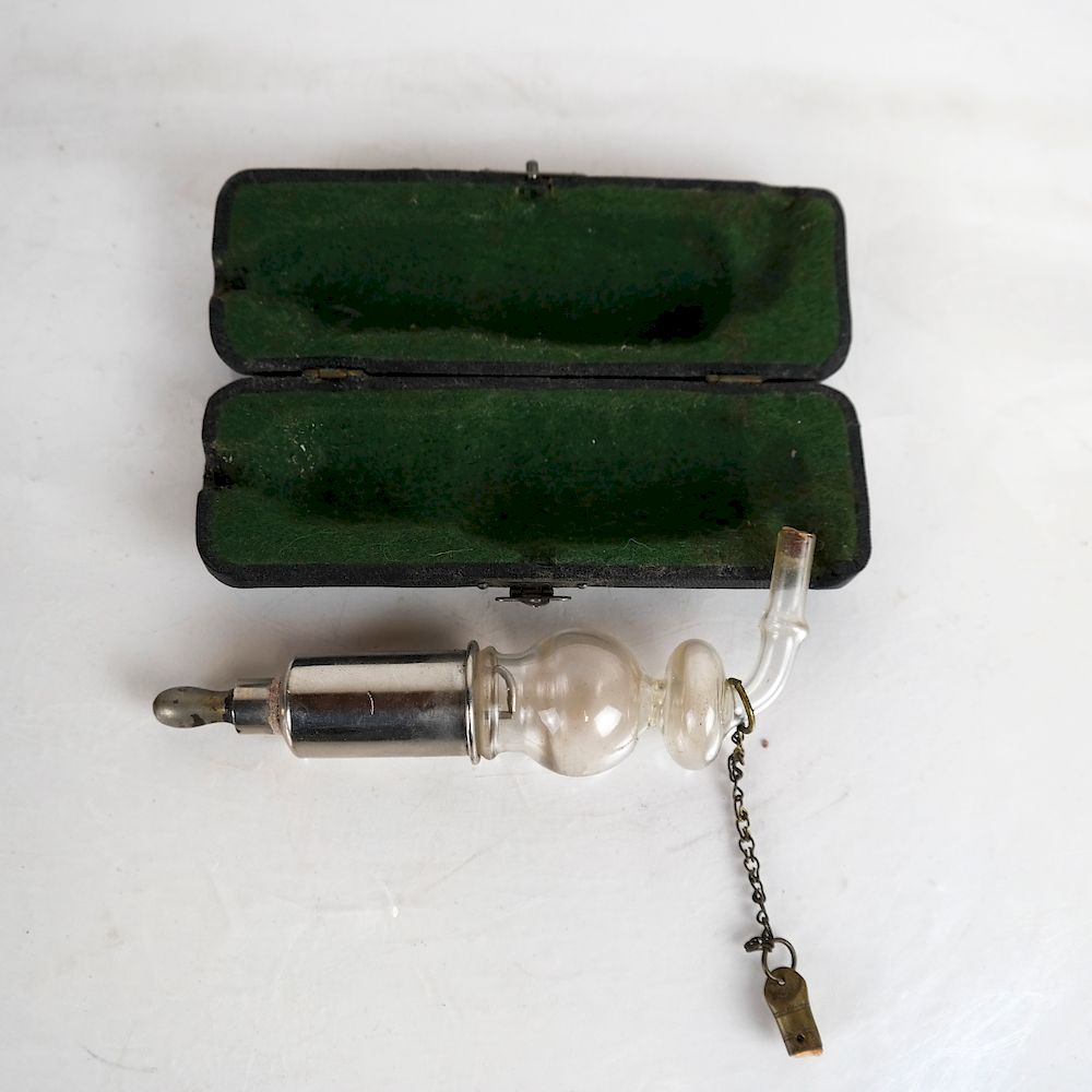 Appraisal: Juriopin Inhalator Opium Pipe Possibly Glass pipe and original case