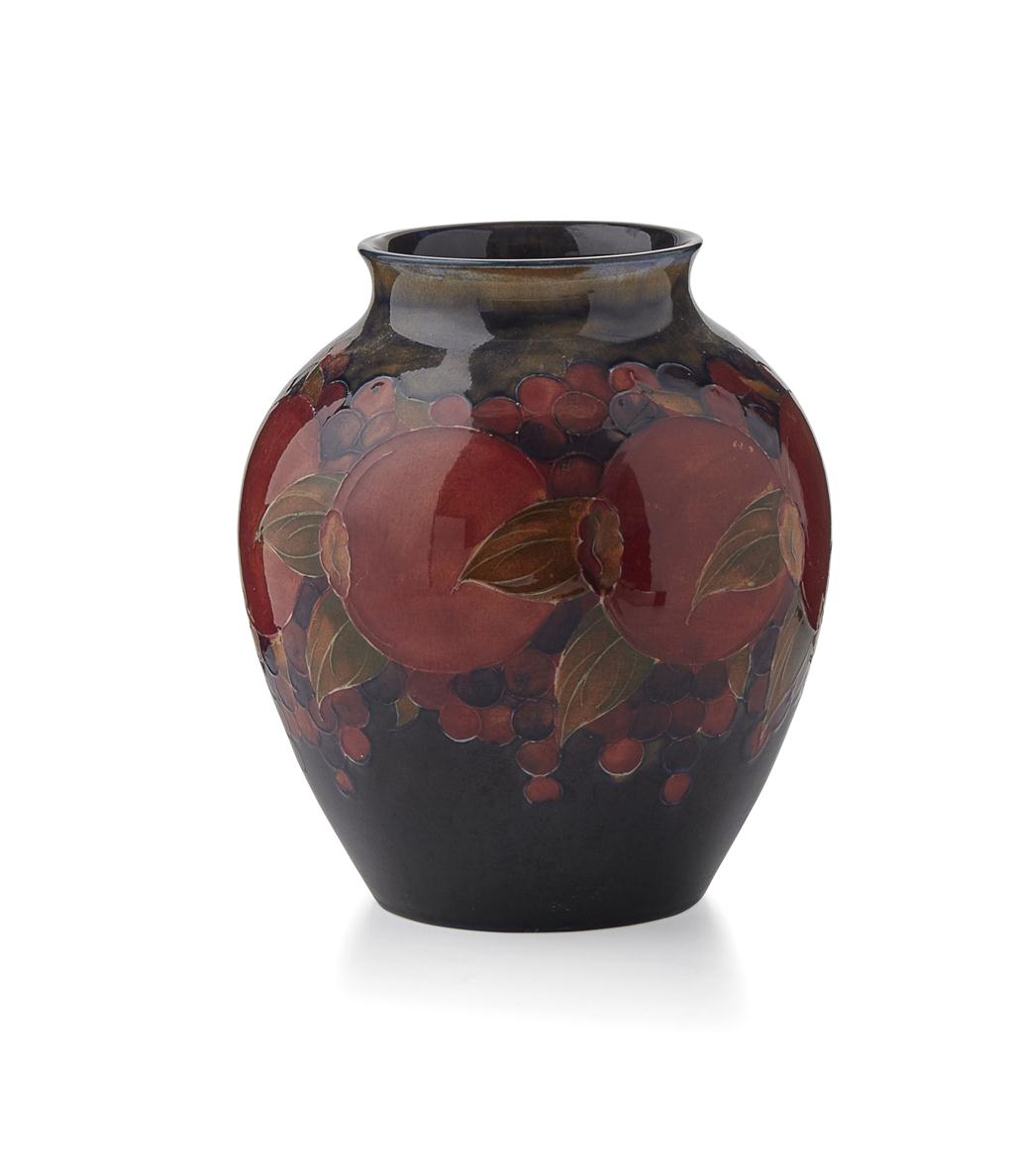 Appraisal: MOORCROFT POTTERY 'POMEGRANATE' PATTERN BALUSTER VASE S impressed maker's marks