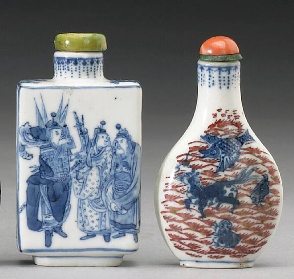 Appraisal: Four underglaze blue decorated porcelain snuff bottles th Century The