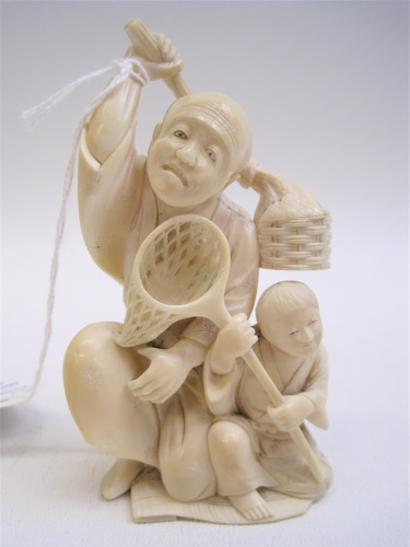 Appraisal: JAPANESE IVORY CARVED FIGURE c - of a man carrying