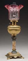 Appraisal: BRADLEY HUBBARD JUNIOR BANQUET LAMP B H brass font mounted