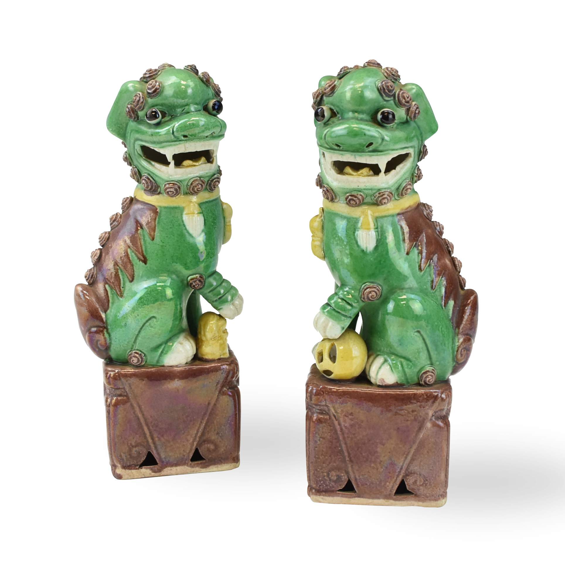 Appraisal: PAIR OF CHINESE SANCAI GLAZED FOO-DOG ROC PERIOD Chinese Republic