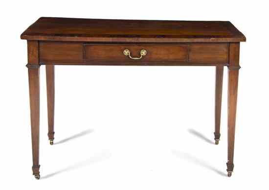 Appraisal: An English Mahogany Writing Desk having a banded rectangular top