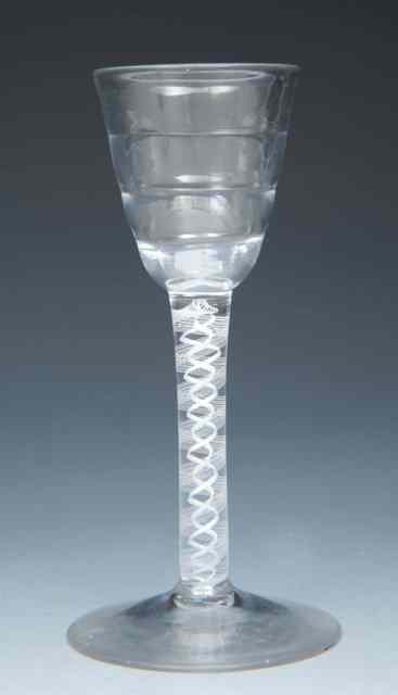 Appraisal: A LYNN WINE GLASS on opaque twist stem and conical