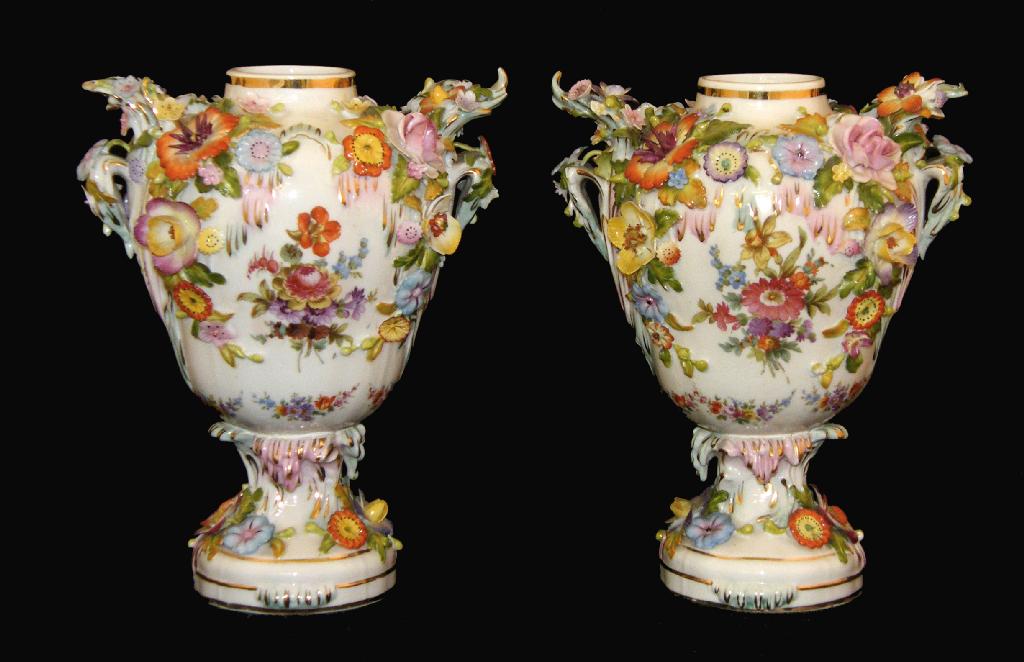 Appraisal: Pair of Sitzendorf baluster pedestal vases encrusted and painted with