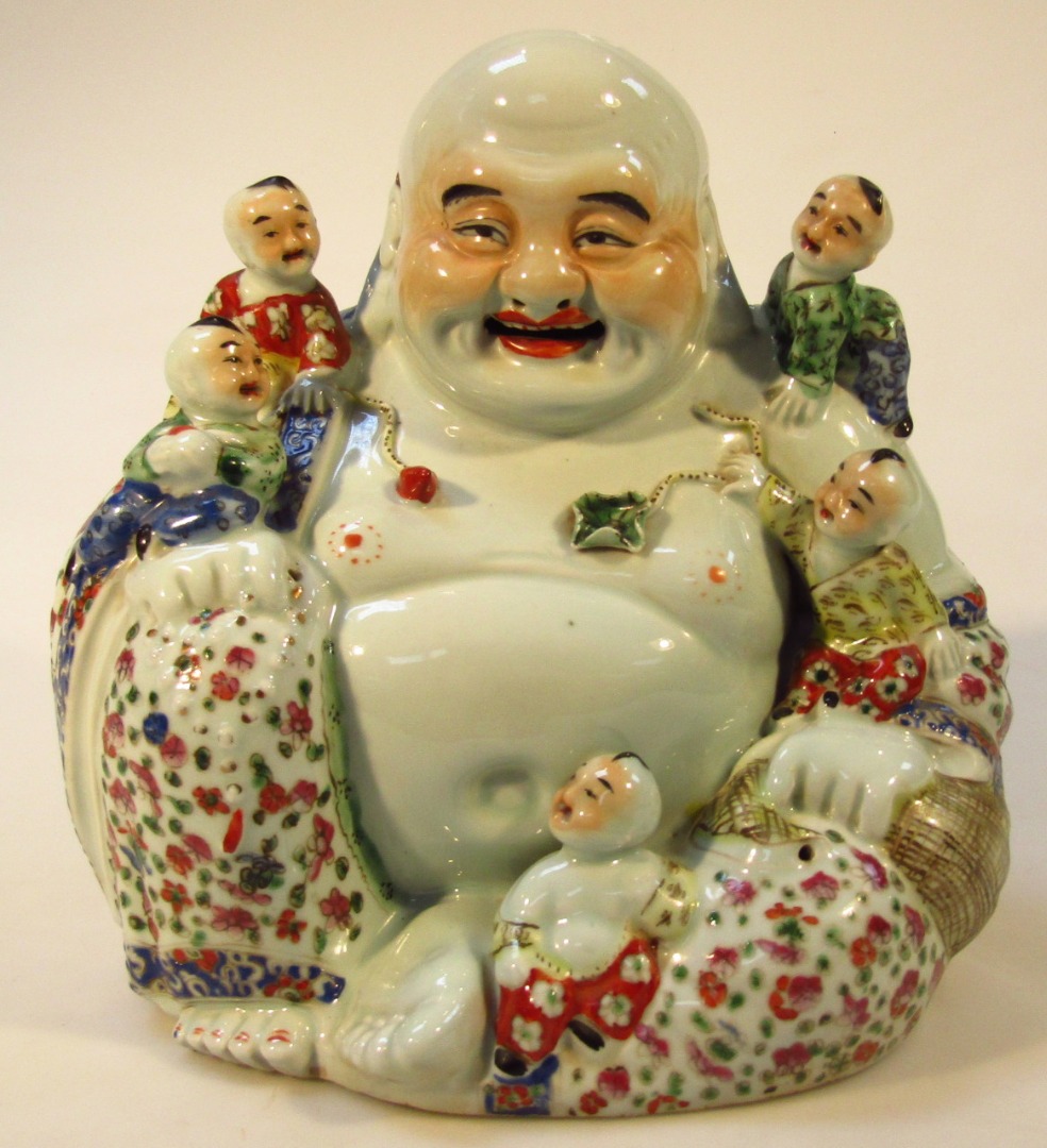 Appraisal: A Chinese porcelain Ming style figure of Buddha in famille