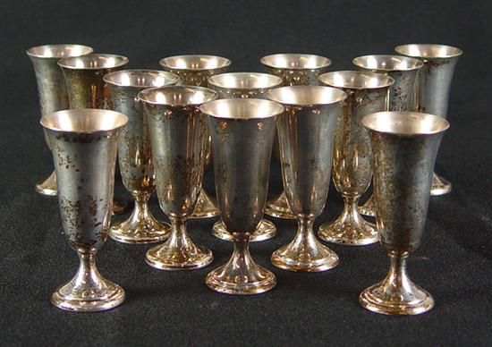 Appraisal: Group of Alvin Sterling Cordials Fourteen conical footed sterling cordials