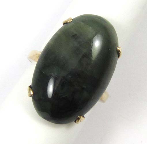 Appraisal: NEPHRITE JADE AND TEN KARAT GOLD RING set with an