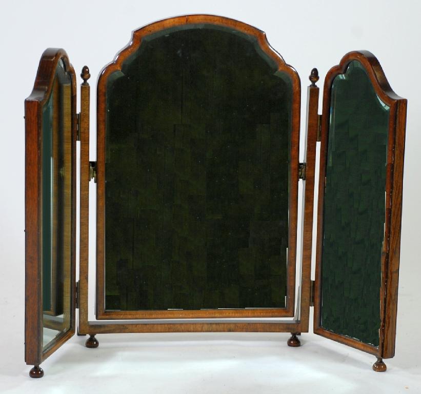 Appraisal: GEORGIAN STYLE WALNUTWOOD FRAMED TRIPTYCH TOILET MIRROR with bevelled mirror