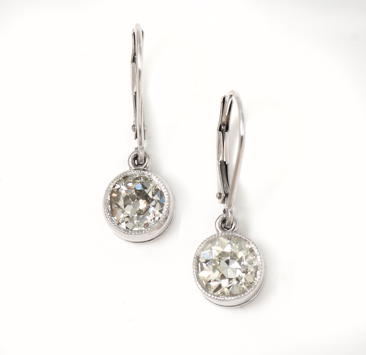 Appraisal: PLATINUM CTW EURO CUT DIAMOND DANGLE EARRINGS Simple and elegant