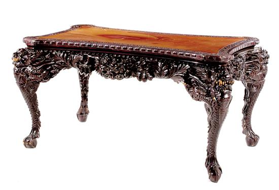 Appraisal: Japanese carved hardwood console table shaped top above boldly carved