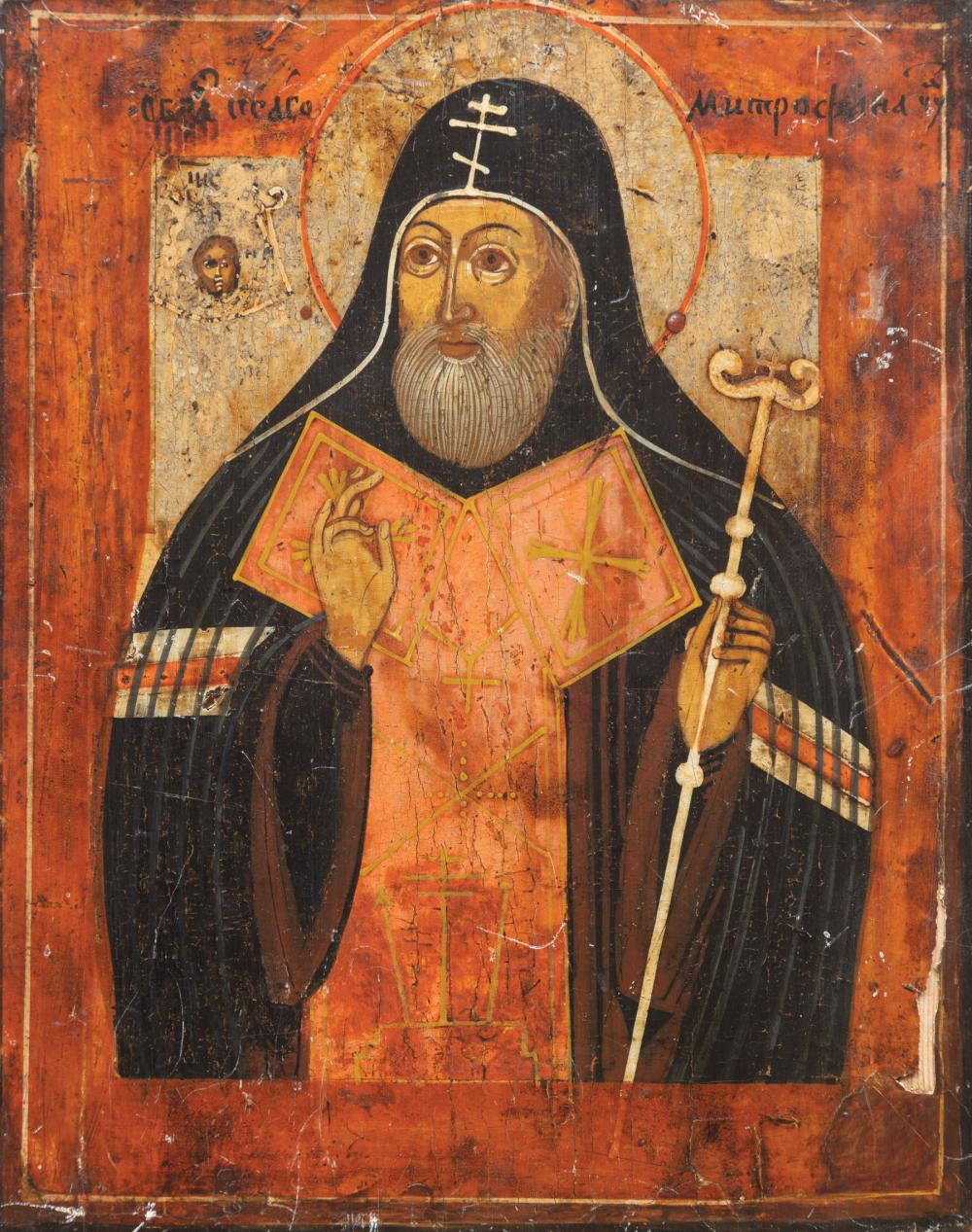 Appraisal: Russian Icon of a Saint Holding a Staff th c