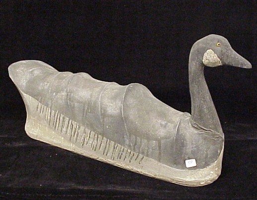 Appraisal: Goose decoy canvas wooden base carved head with yellow glass