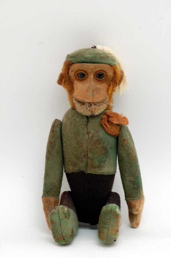 Appraisal: Figural medicine bottle in the shape of a monkey flocked