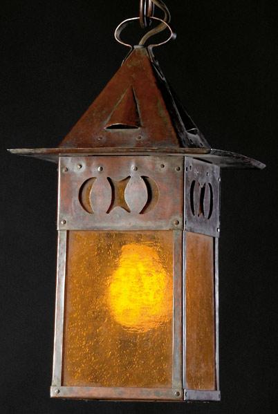 Appraisal: GUSTAV STICKLEY Hammered copper hanging lantern with vent caps lined