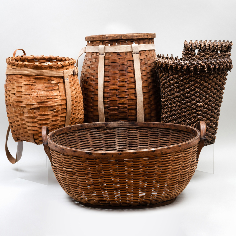 Appraisal: GROUP OF FOUR WOVEN BASKETS AND AN APPLE BASKET Two