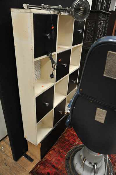 Appraisal: A 'S BLACK AND WHITE PIGEON HOLE CABINET