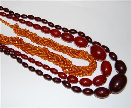 Appraisal: A collection of items to include several assorted amber bead