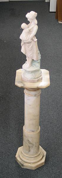 Appraisal: An Italian carved and tinted alabaster figure of a mother