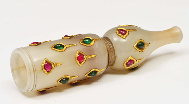 Appraisal: A MUGHAL JADE HOOKAH MOUTH PIECE decorated with green and