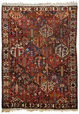 Appraisal: Baktiari rug repeating floral geometric and animal decoration with hexagonal