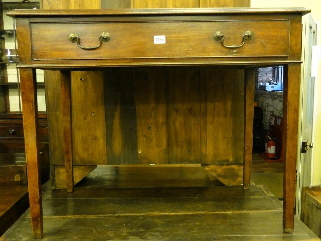 Appraisal: A Georgian mahogany side table fitted with a single frieze