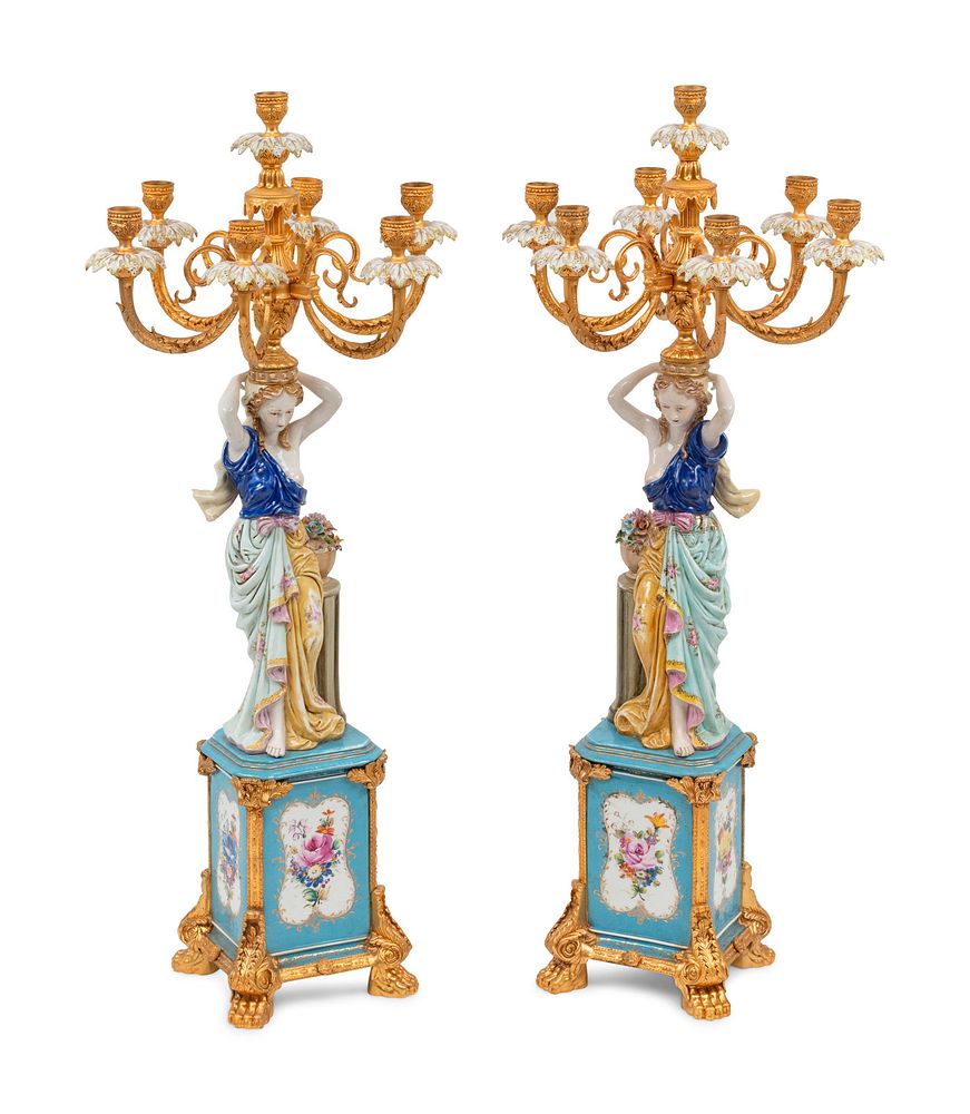 Appraisal: A Pair of German Porcelain and Gilt Bronze Figural Seven-Light