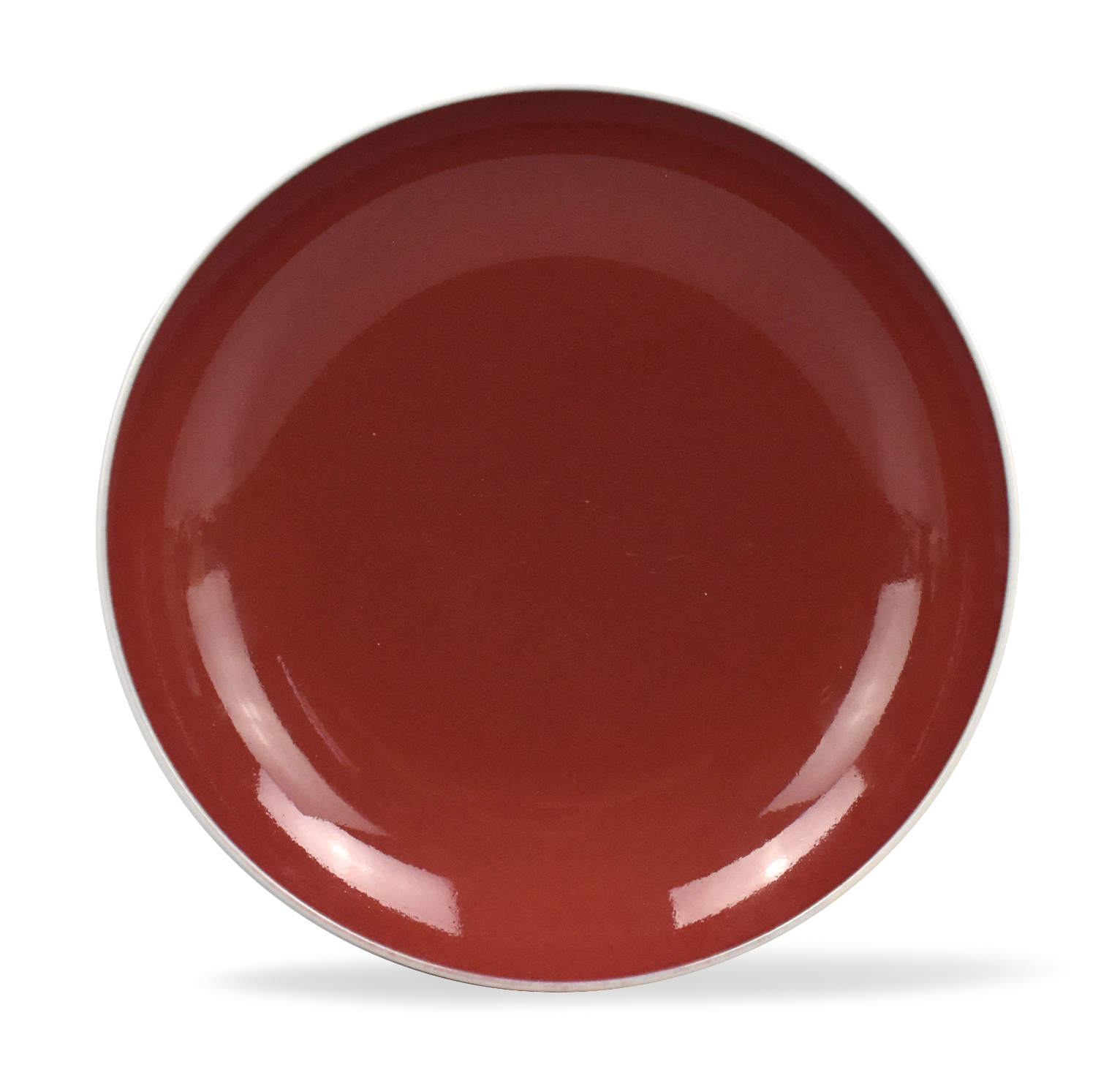 Appraisal: A Chinese red glaze plate with a Qianlong mark Red