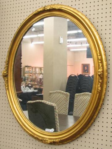 Appraisal: Oval French Style Wall Mirror decorator quality with molded carvings