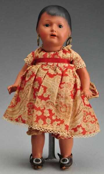 Appraisal: Ernst Heubach Character Child Doll Description Brown bisque-type socket head