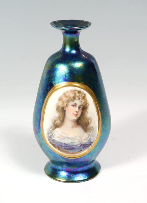 Appraisal: AUSTRIAN IRIDESCENT PORCELAIN PORTRAIT VASE Blue iridescent vase featuring the