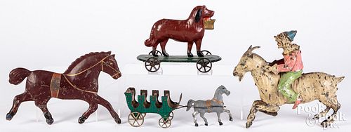 Appraisal: PAINTED TIN TOY GROUPPainted tin toy group to include American