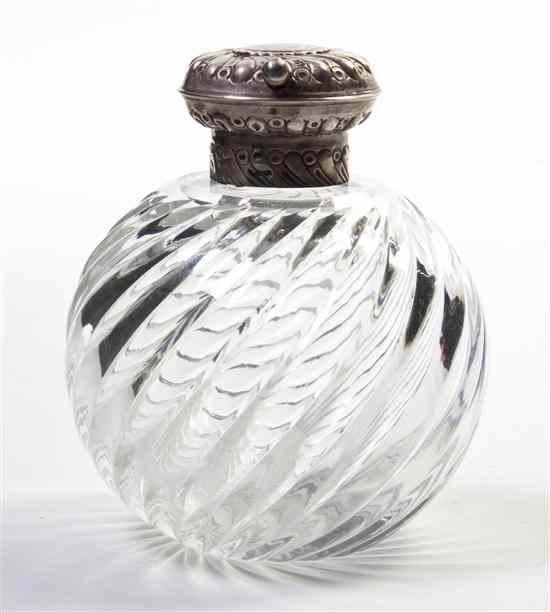 Appraisal: A Silver Mounted Glass Perfume Bottle the silver cap having