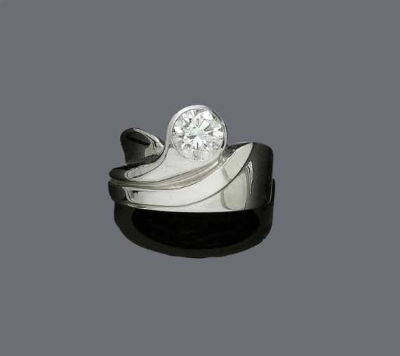 Appraisal: DIAMOND AND GOLD RING White gold Casual-elegant band ring the