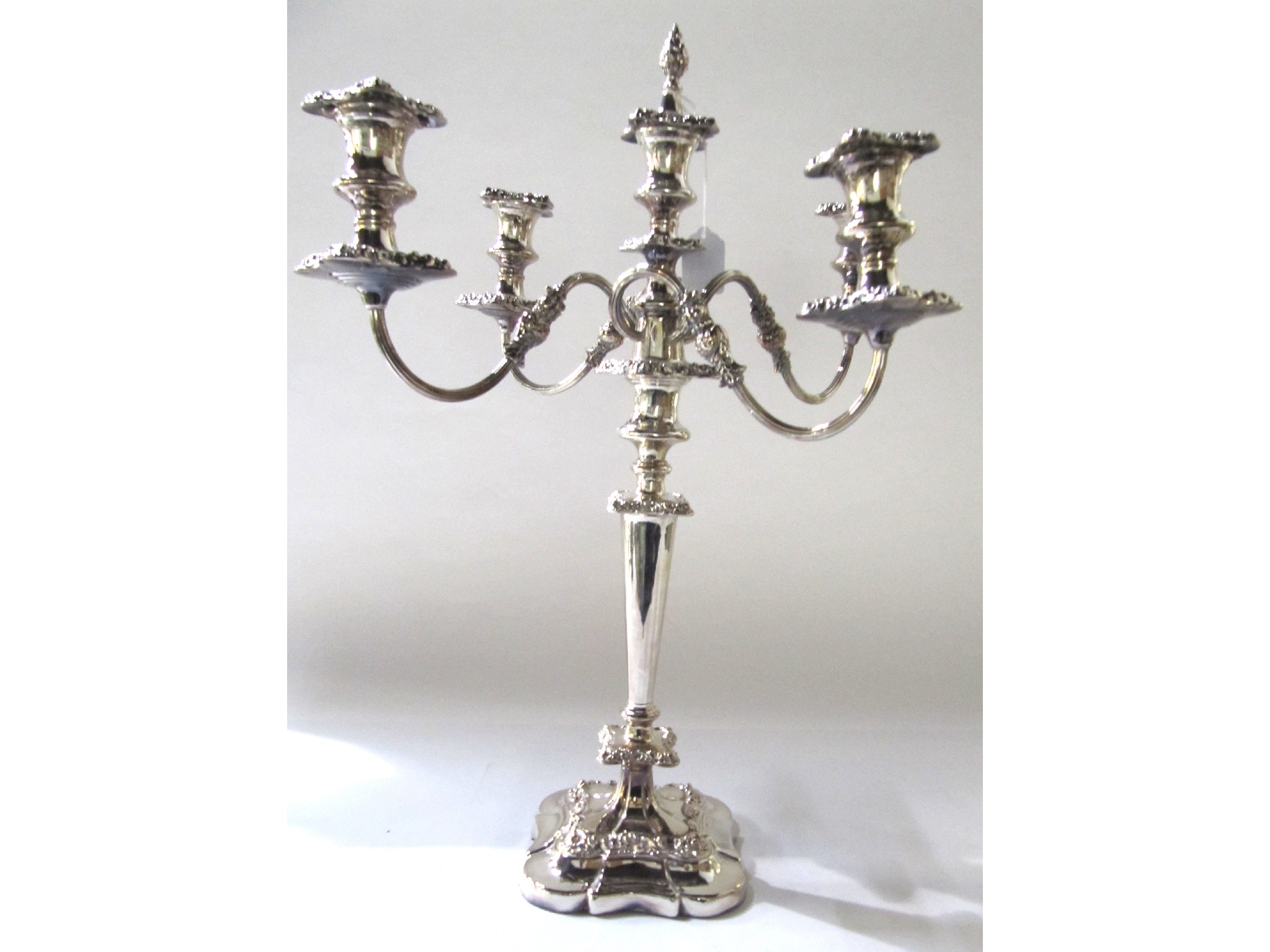 Appraisal: A silver plated four-branch candelabrum