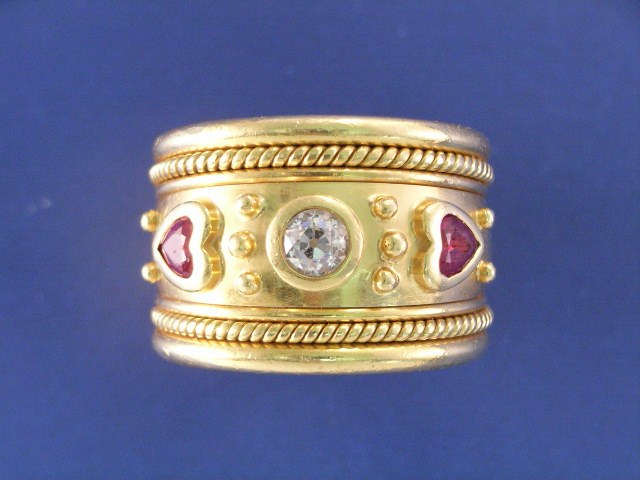 Appraisal: An ct gold contemporary diamond and two ruby set dress