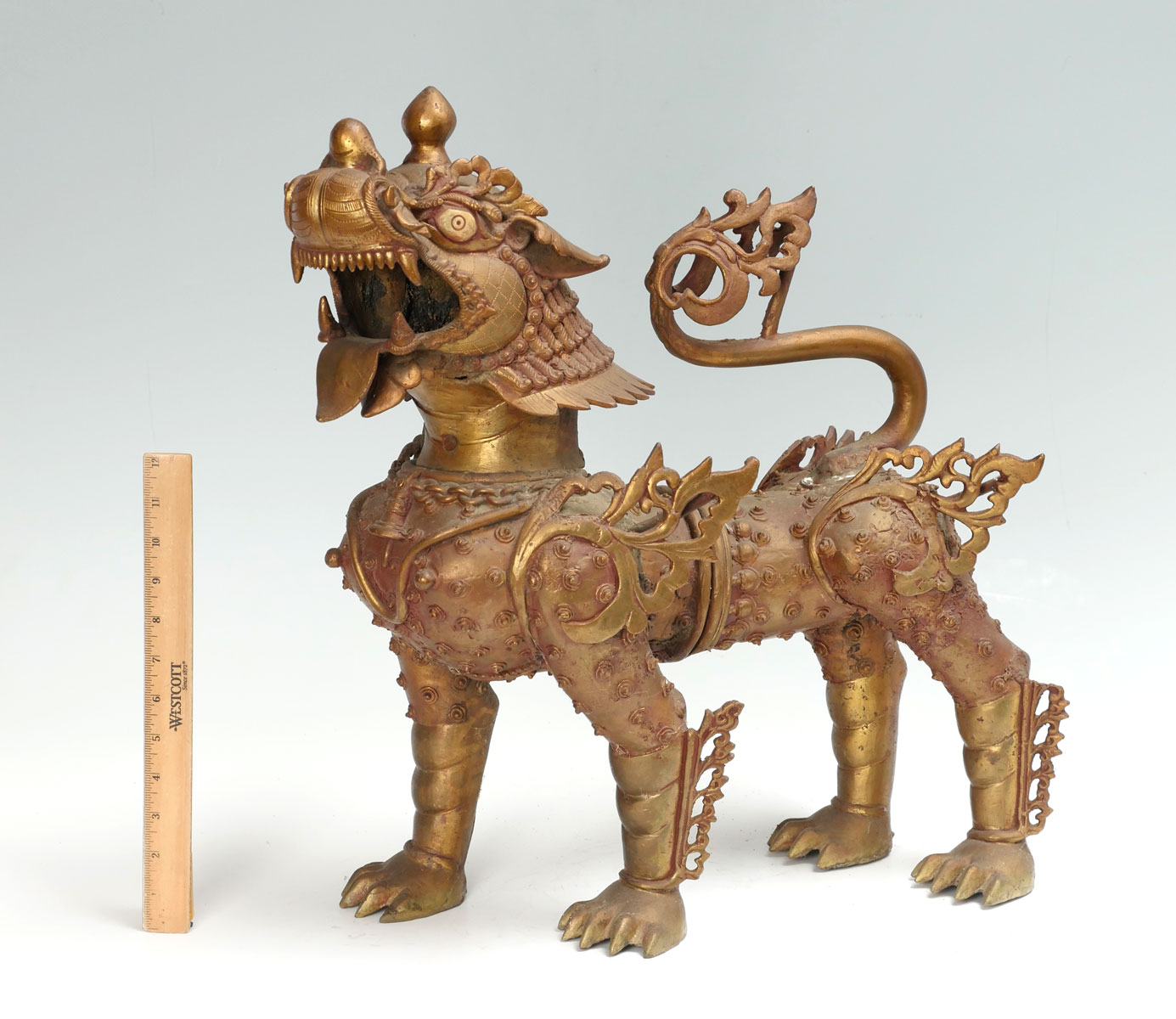 Appraisal: LARGE GILT BRONZE CHINESE ARCHAIC STYLE FOO DOG LION Large