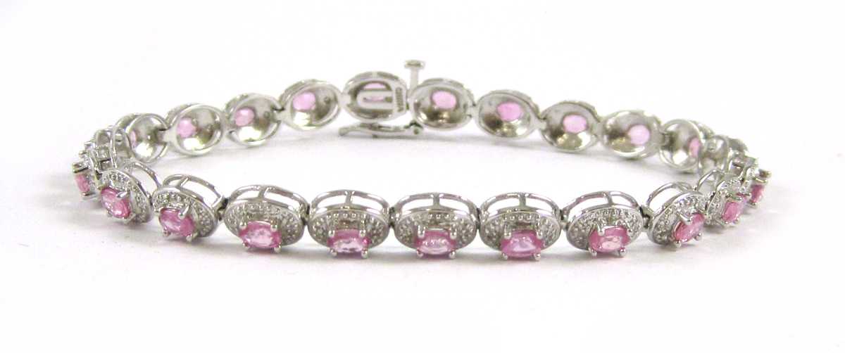 Appraisal: PINK SAPPHIRE AND DIAMOND BRACELET The k white gold bracelet