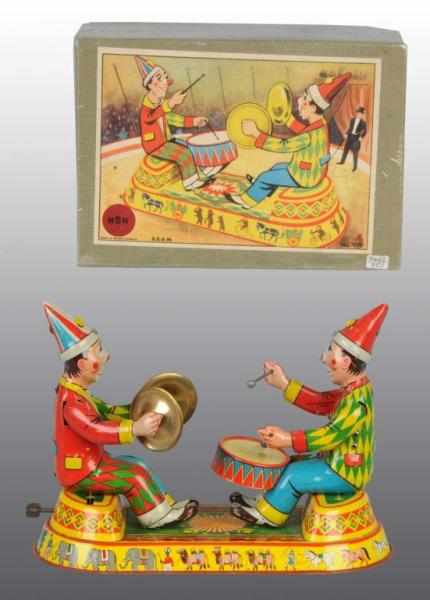 Appraisal: Tin Clown Musicians Wind-Up Toy Description German Working Very hard-to-find