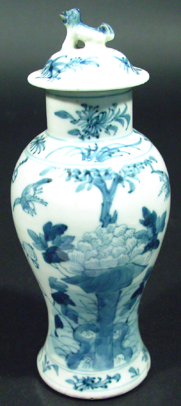 Appraisal: Oriental porcelain baluster vase and lid with dog of foo