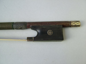 Appraisal: A silver mounted violin bow The frog with silver and