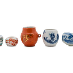 Appraisal: Five Chinese Porcelain Bird Feeders comprising a coral-red glazed example